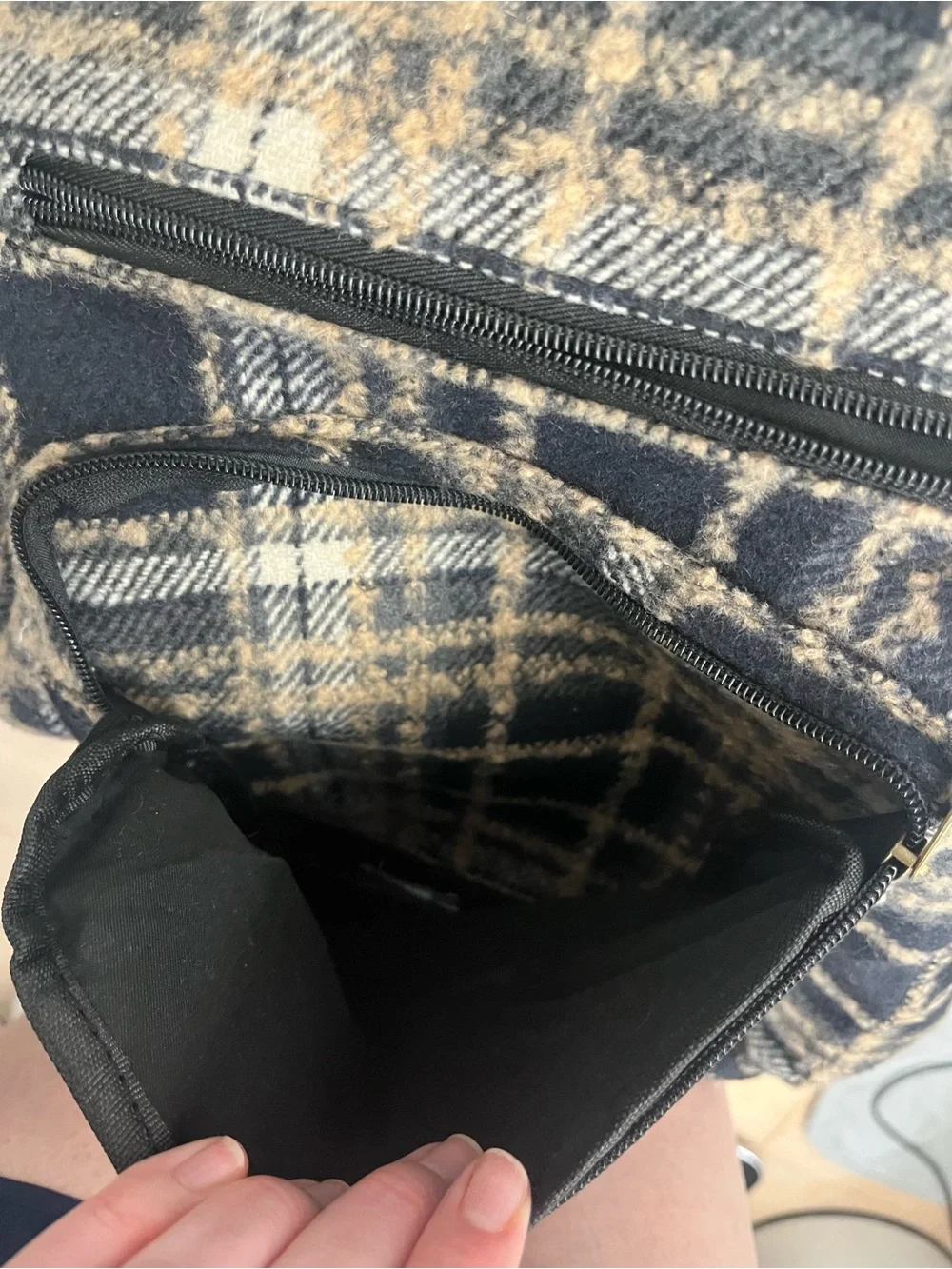 Natural Reflections black and beige plaid backpack